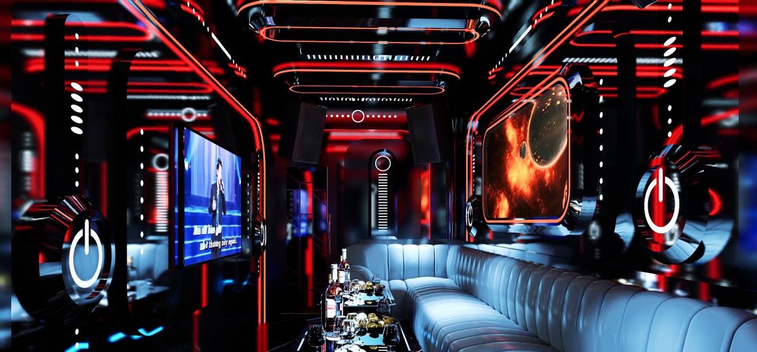 HERMES PARIS KTV 紅色霓虹包廂，黑鏡面牆上的圓形電源符號燈飾與白色長皮卡座